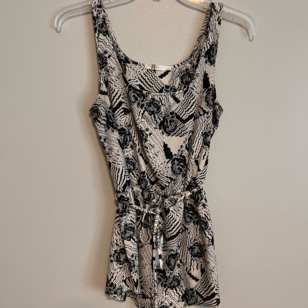 Black and white printed cinch waist top